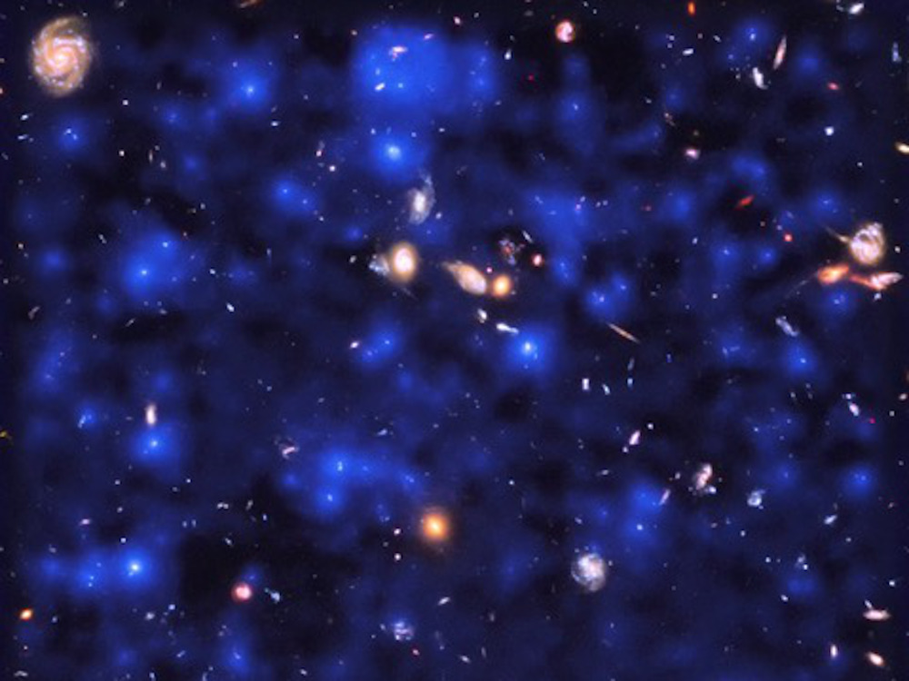 Blau leuchtende und hell glimmende Punkte und Flächen auf dunklem Hintergrund.
